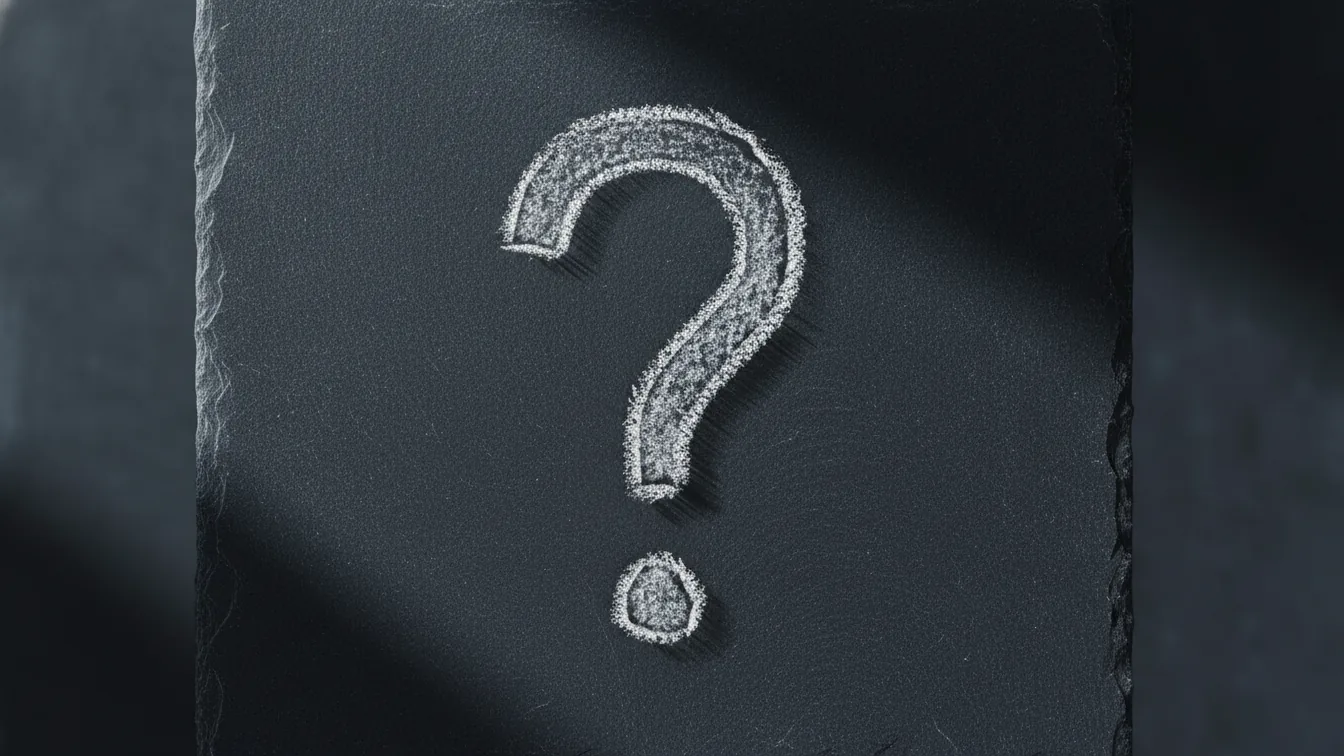 Question mark on dark board
